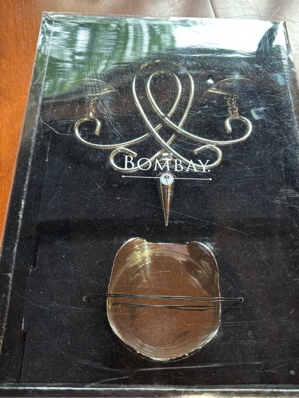 Bombay Gold bottle stopper and candle holder
